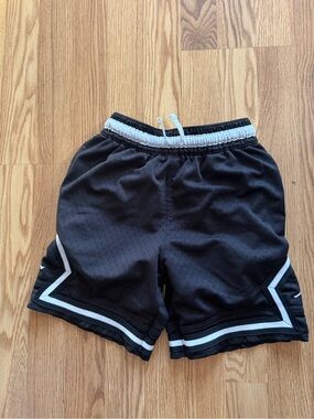 Kids Nike Black Athletic Shorts with White Trim